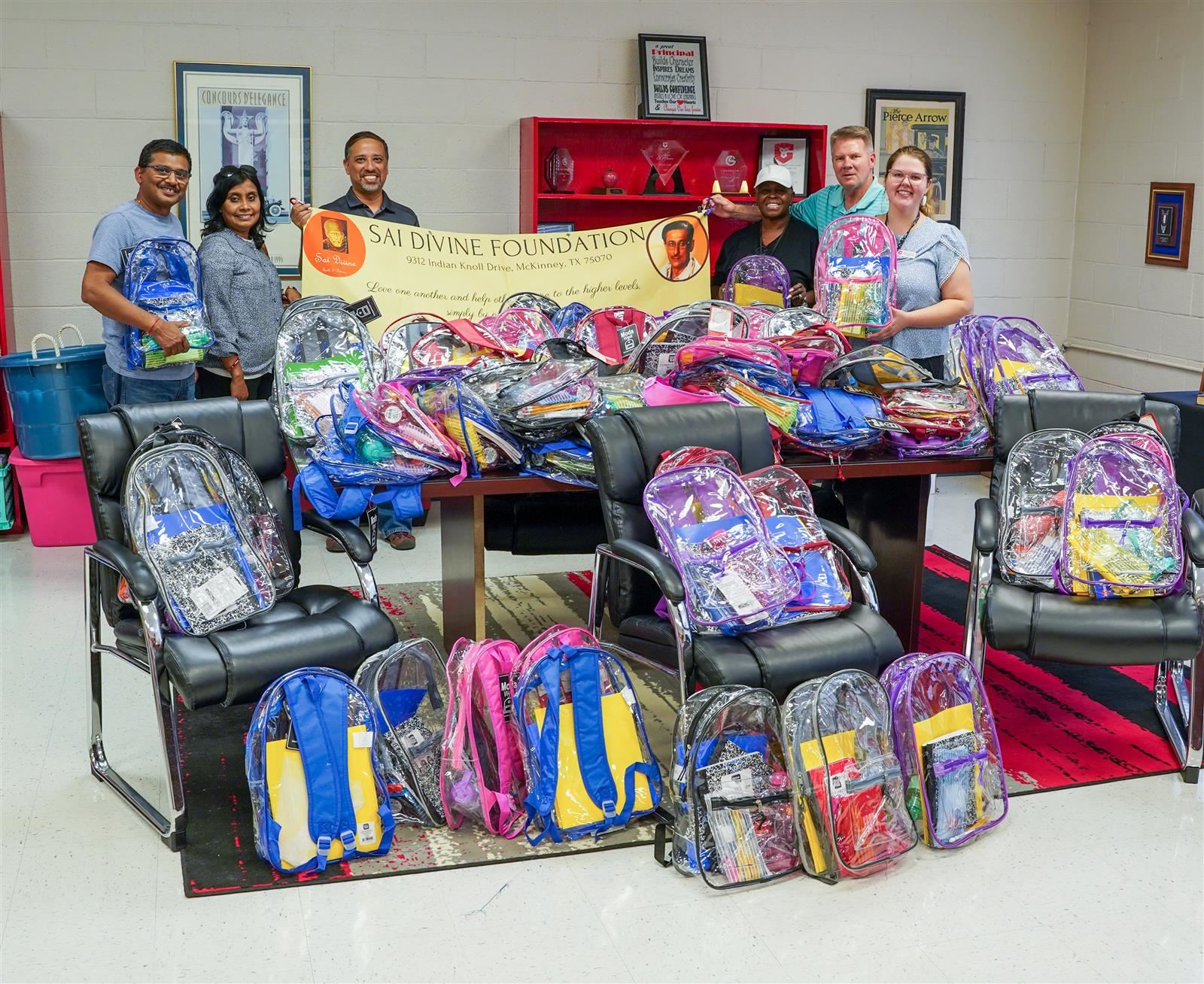 Sai Divine Foundation donates clear backpacks and school supplies for GISD students